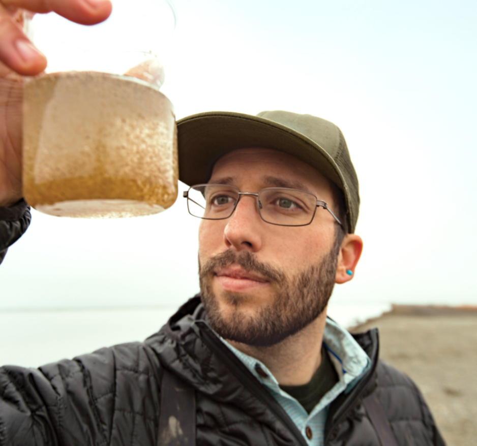 scientist examining water sample